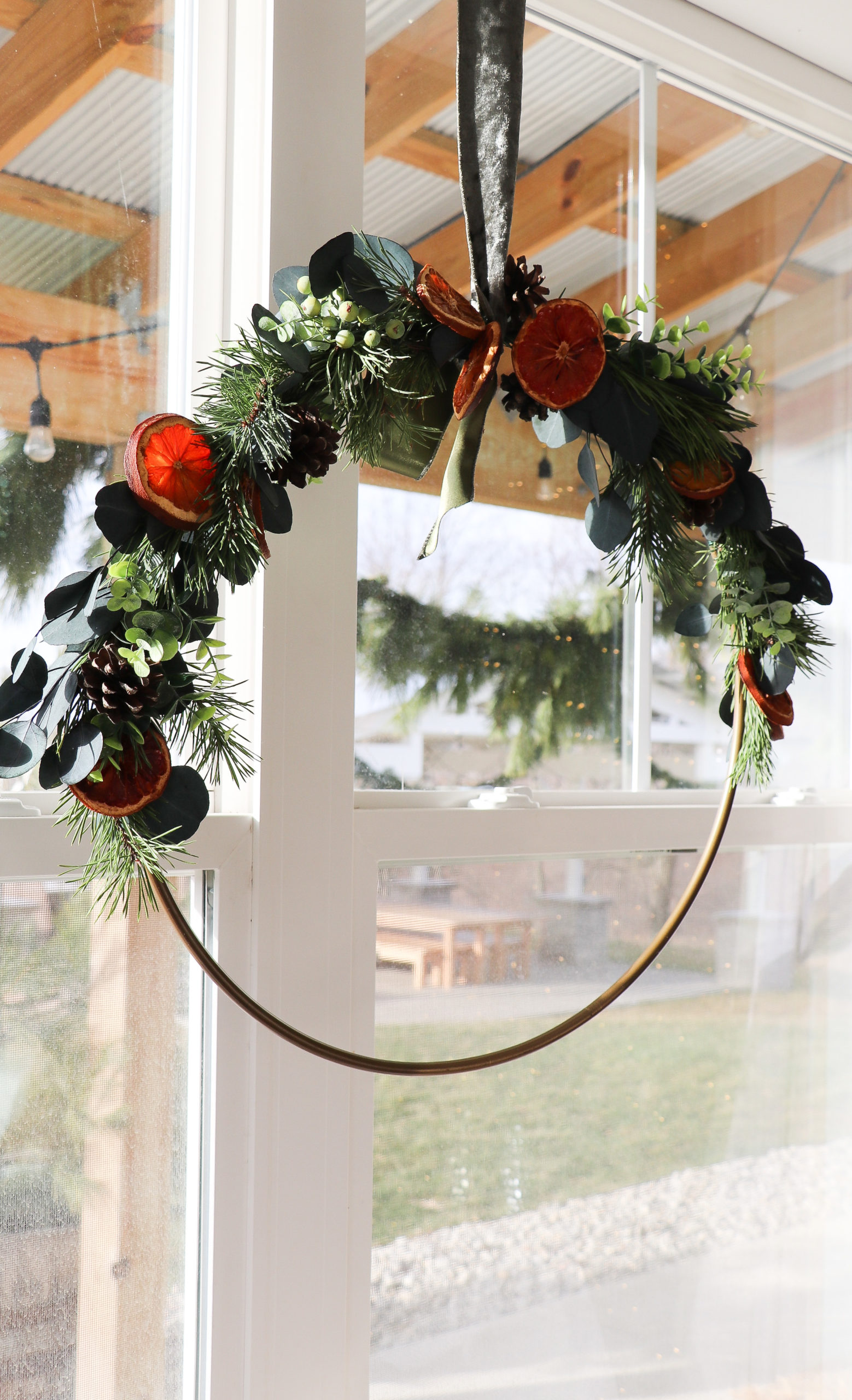 how to decorate and make a dried orange hoop wreath